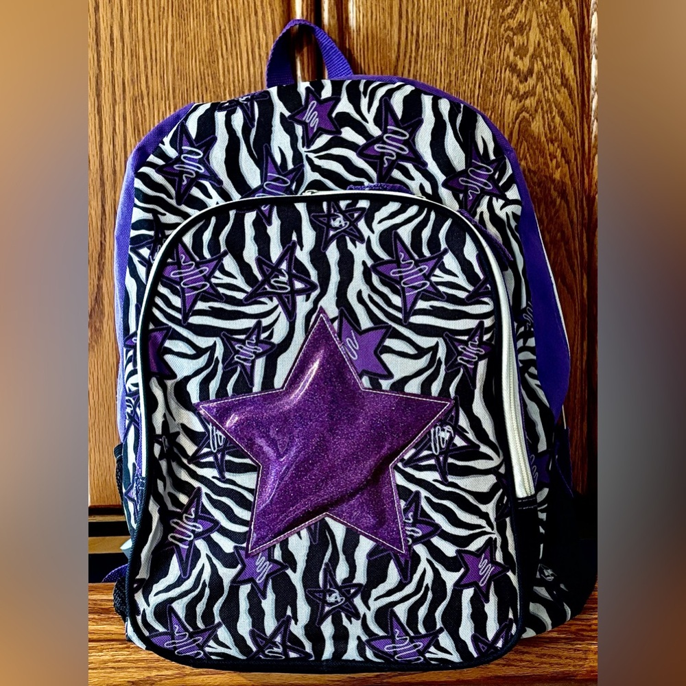 DISTINCTIVE BACKPACK with LOTS OF ROOM & LOTS OF STORAGE AREAS…